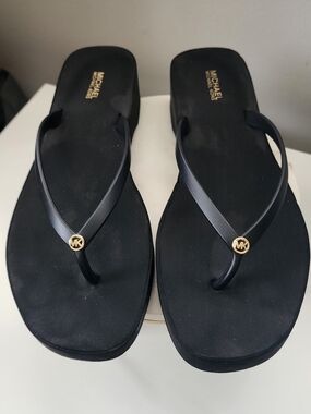 Michael Kors Black Flip Flop Sandals with Gold MK Medallion
